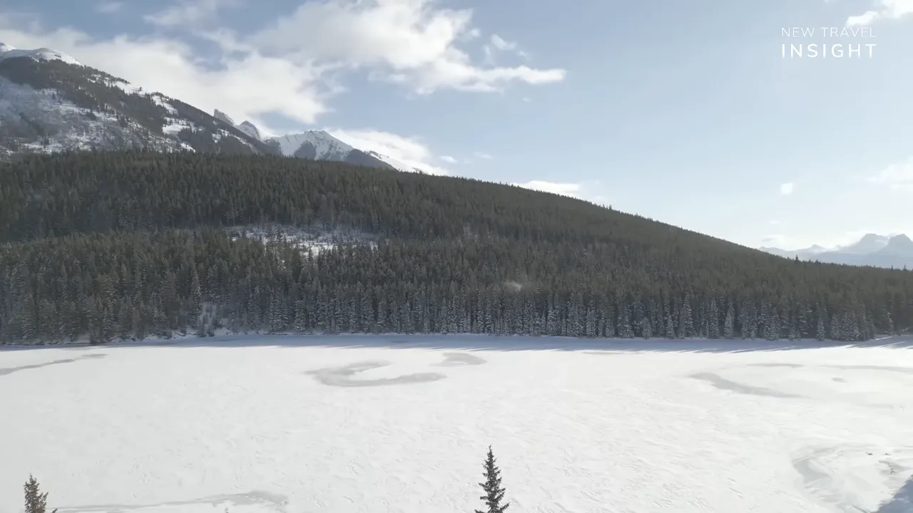 Snow-covered valley and evergreen forest in Banff National Park, Canada