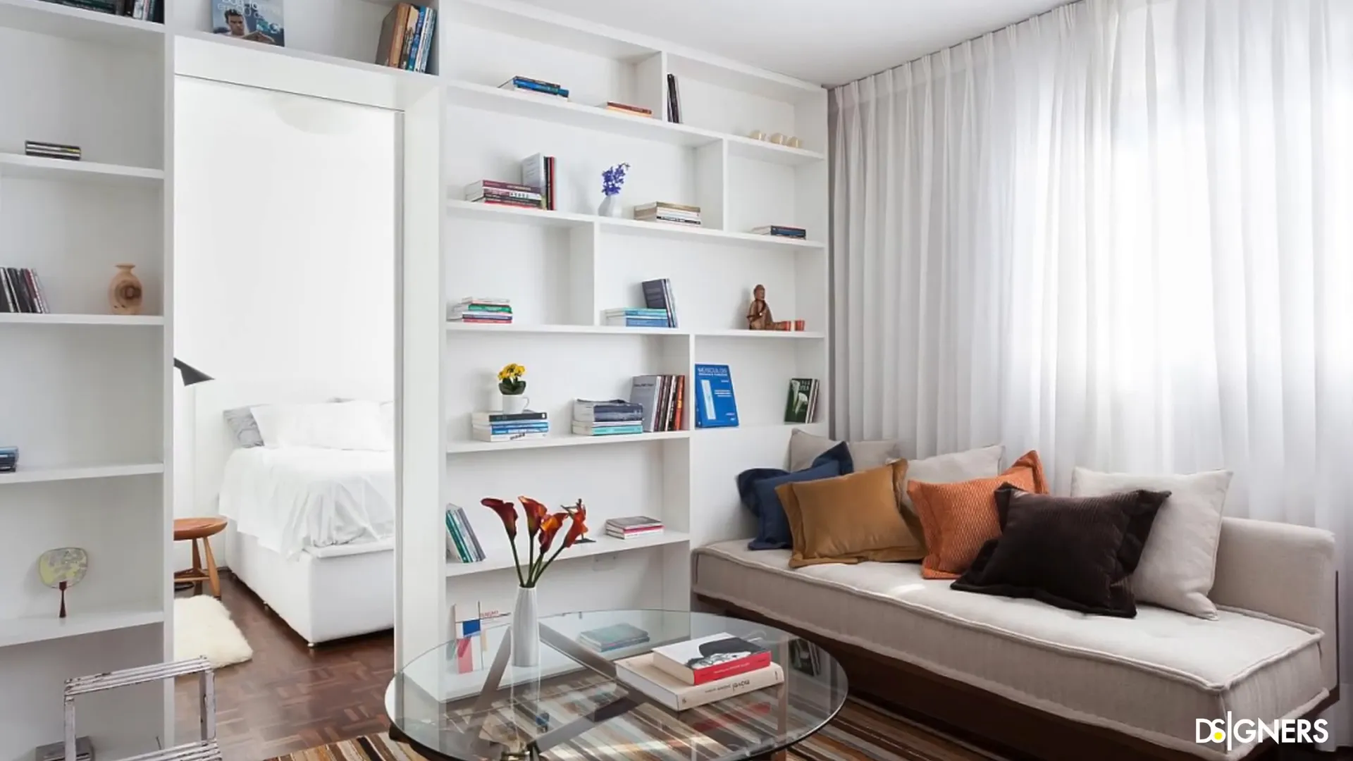 Wall-mounted TV and shelves in a small living room