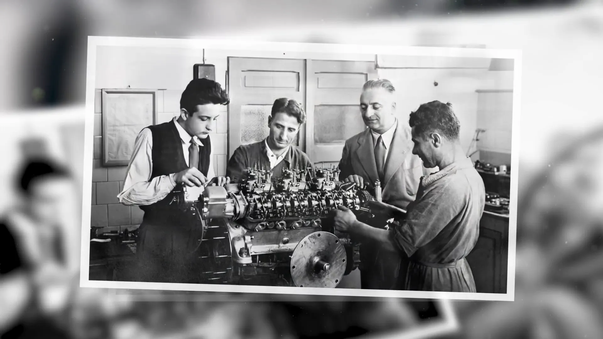 Dino Ferrari with engineers