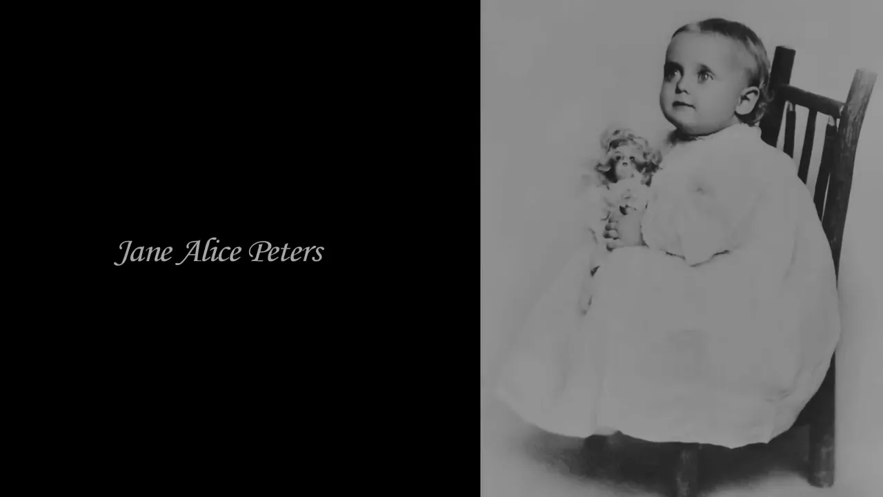 Archival baby portrait labeled 'Jane Alice Peters' showing an infant seated on a chair