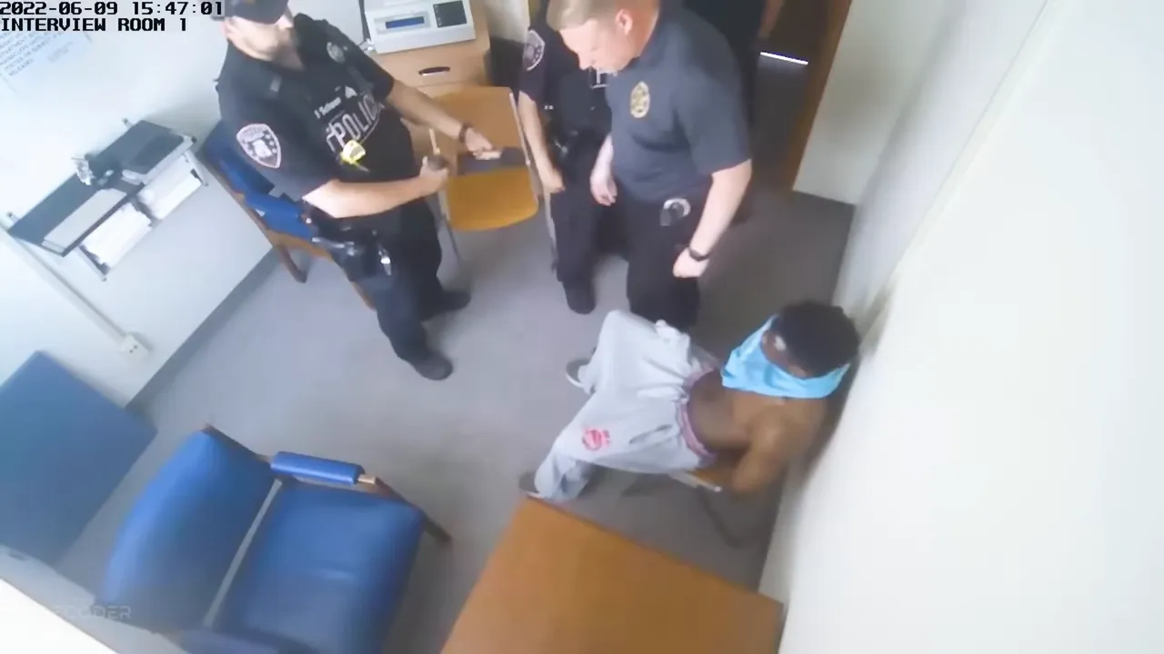 DeAndre being arrested by police in Gillespie