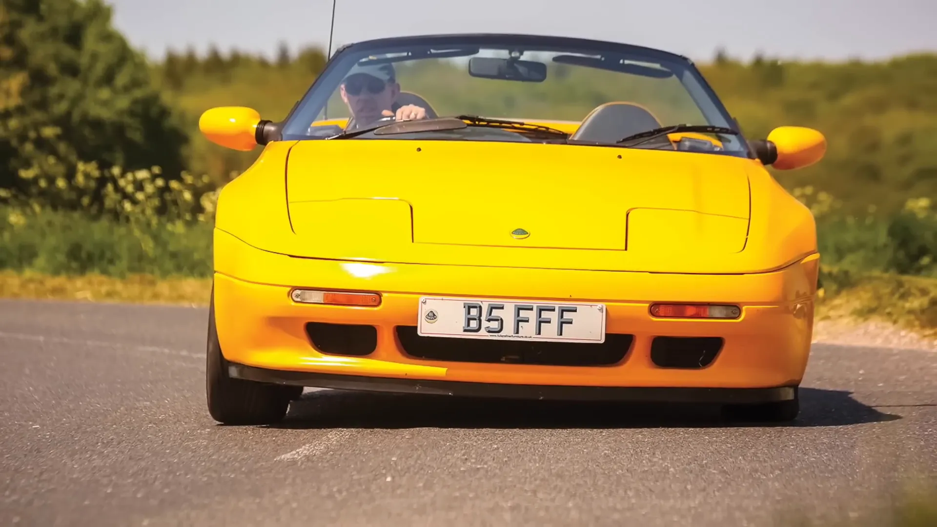 Lotus Elise driving on a track