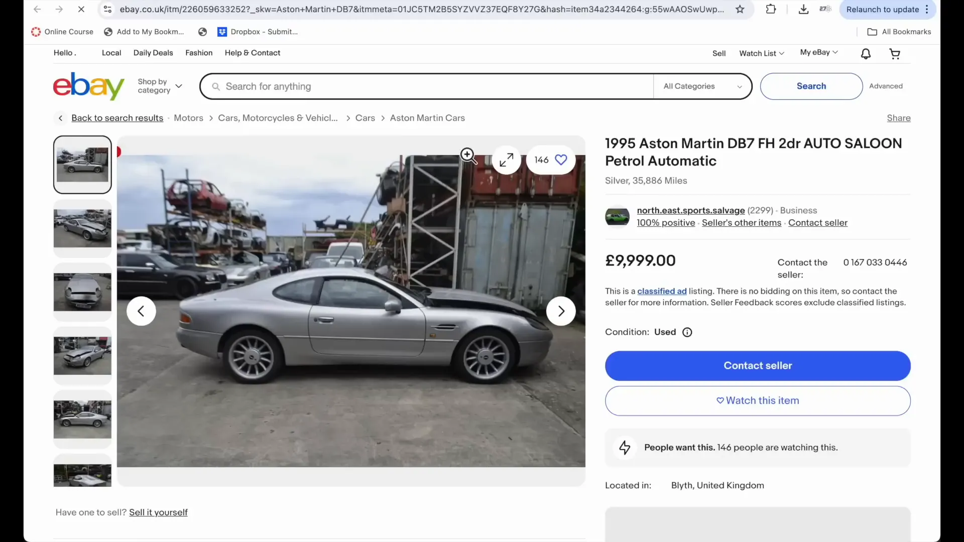 Aston Martin DB7 in a salvage yard