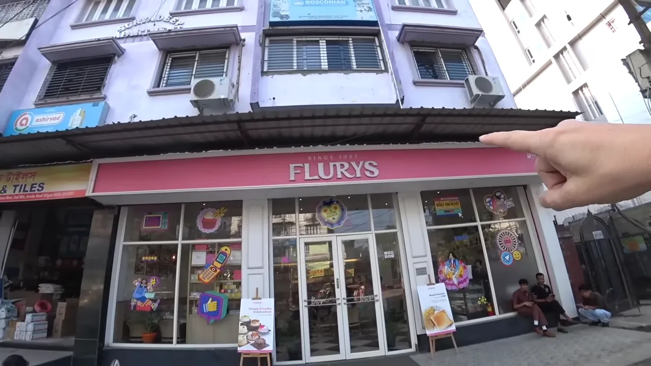 Flurys café storefront in Siliguri with signage above the entrance