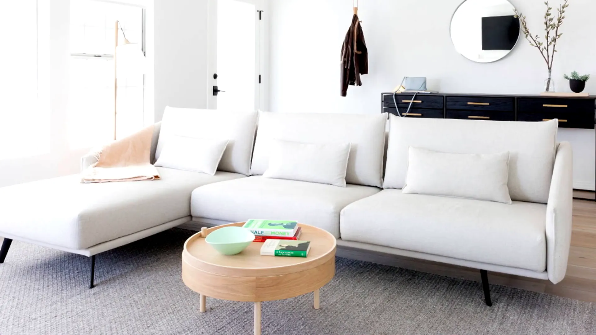 Open living room and kitchen concept in light colors