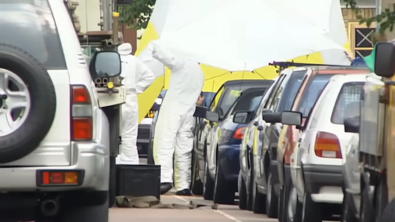 Police press conference announcing a manhunt in West London
