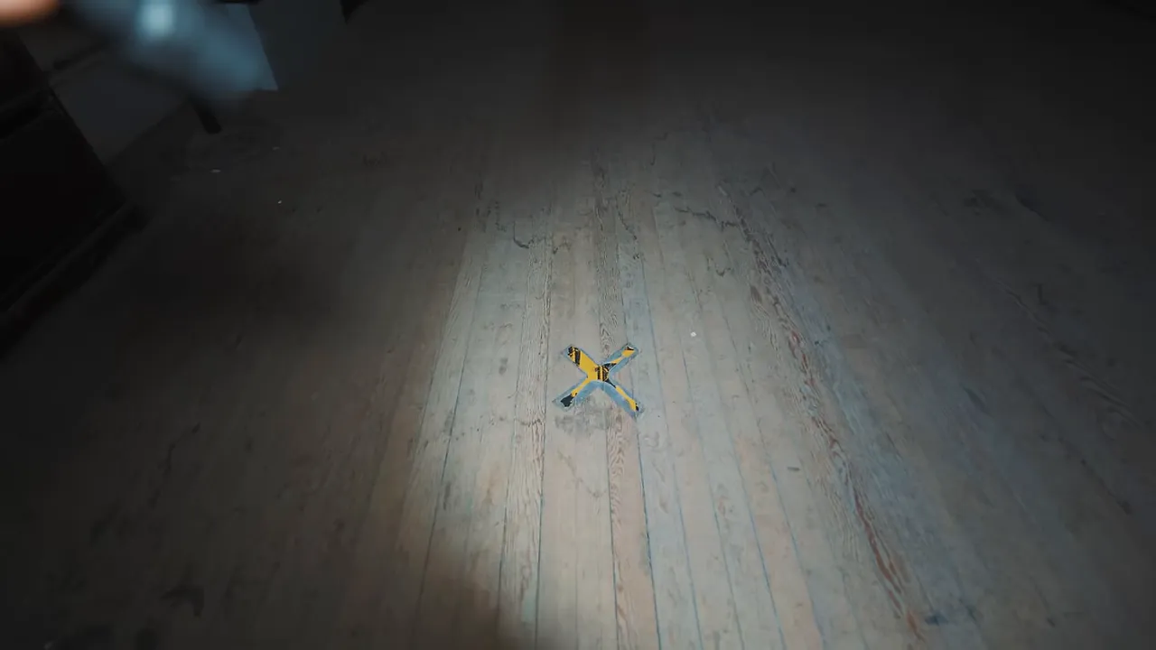 Ballroom interior with a marked X on the floor where Ghost Adventures placed their camera