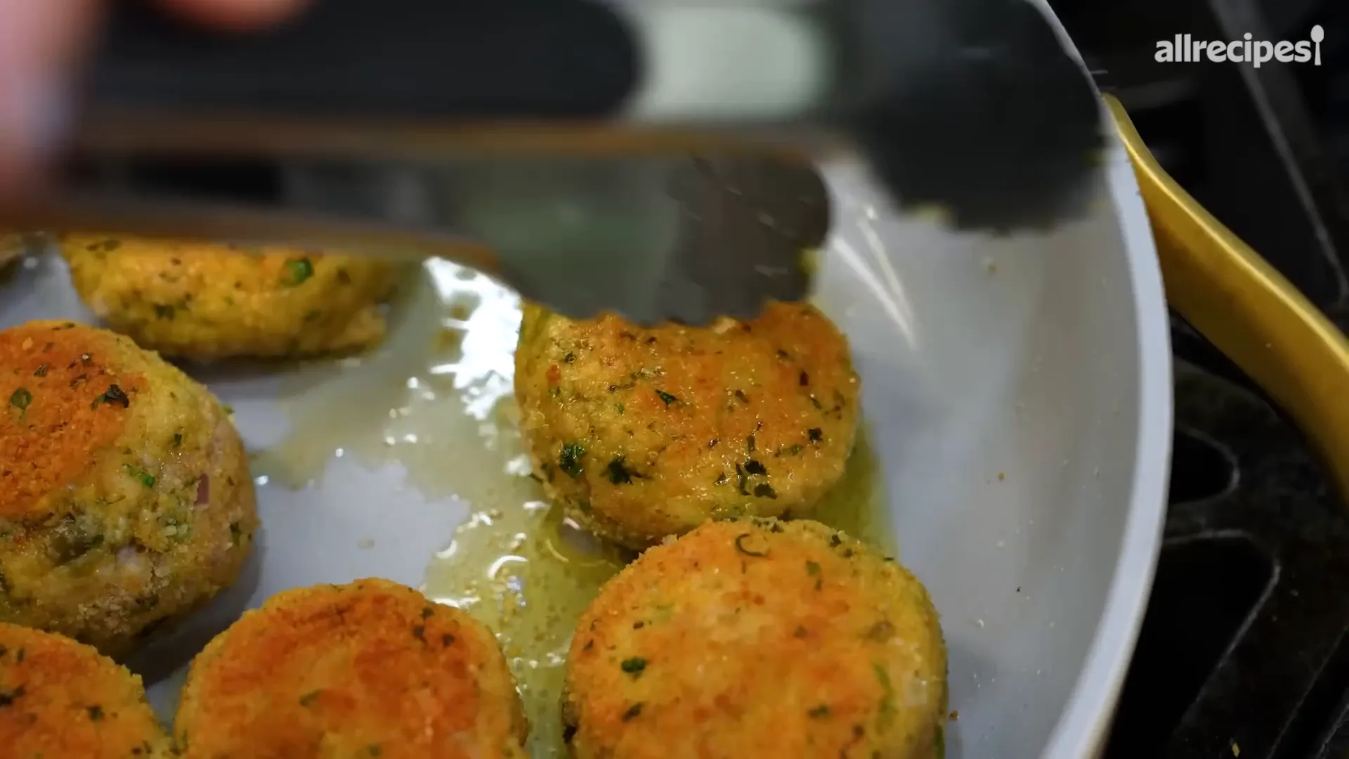 Browning chicken piccata meatballs in olive oil