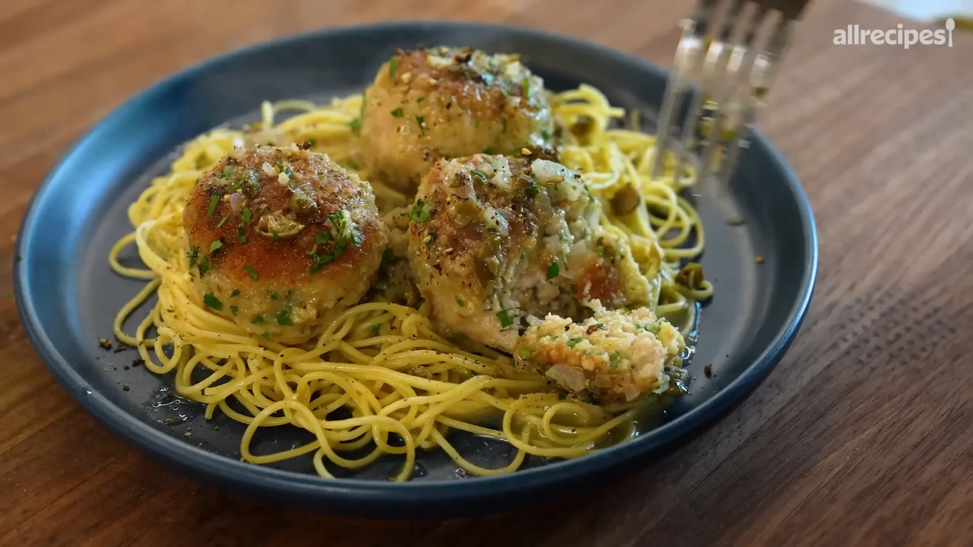 Plated chicken piccata meatballs with angel hair pasta