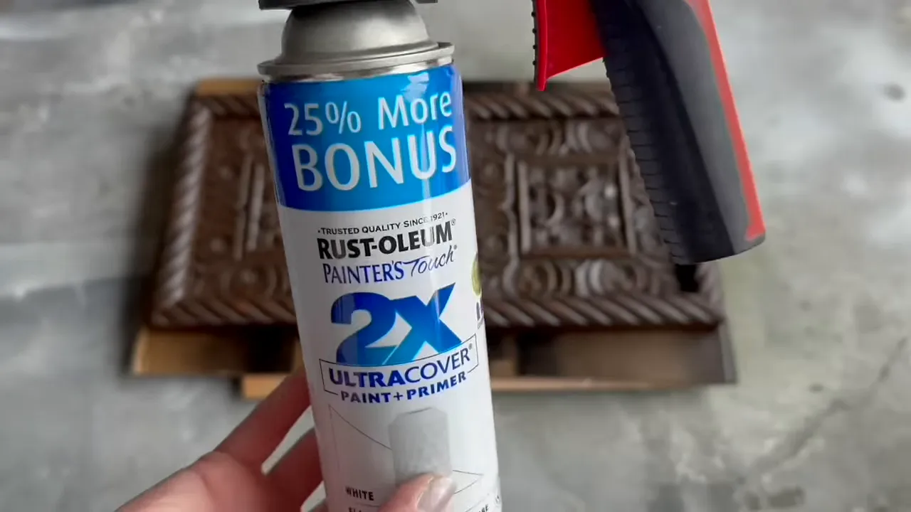 Rust-Oleum 2X Ultracover spray paint can with a red-and-black comfort handle attachment visible at the nozzle