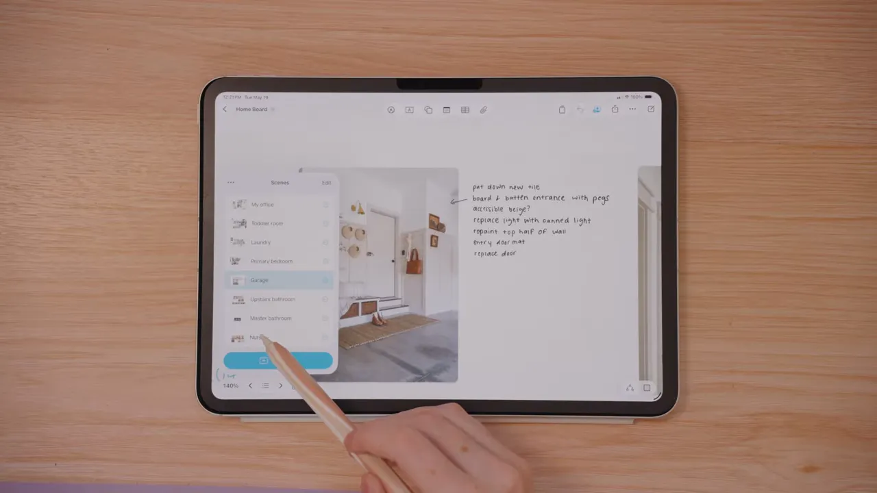 iPad Freeform board with Scenes menu opened and hand selecting a scene