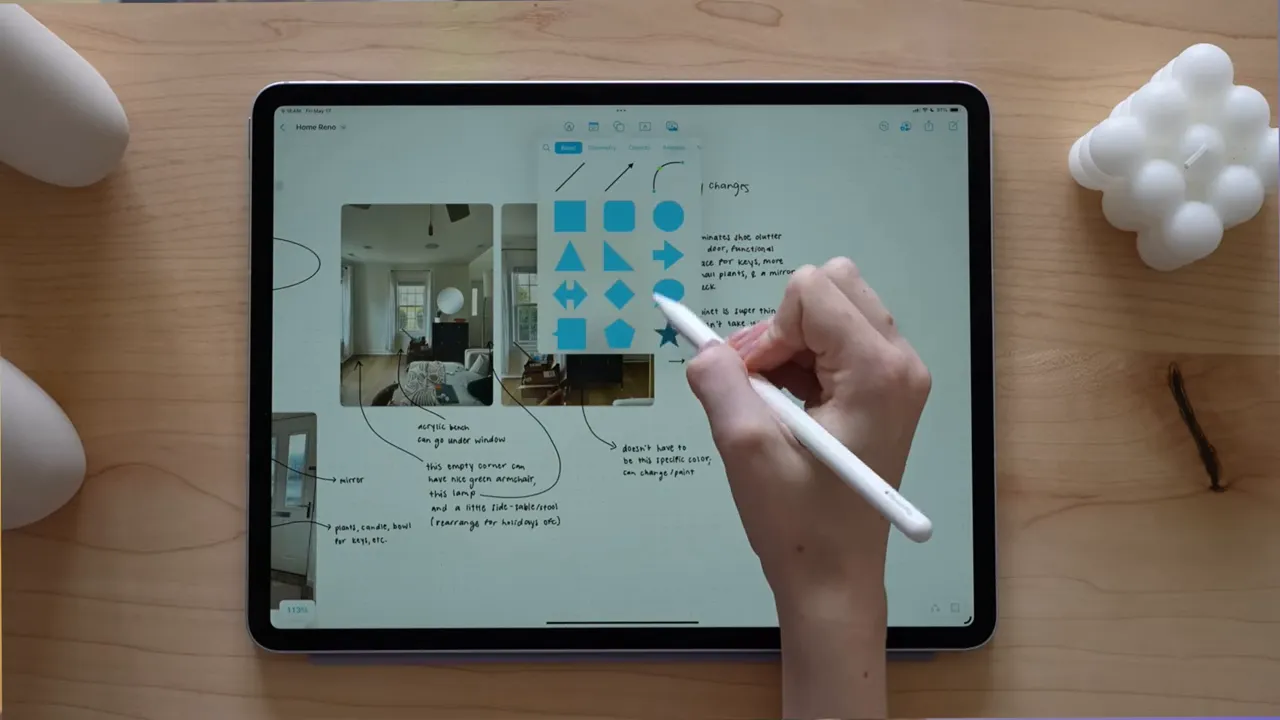 Top-down view of an iPad Freeform canvas with photo, shapes, and sketching in progress