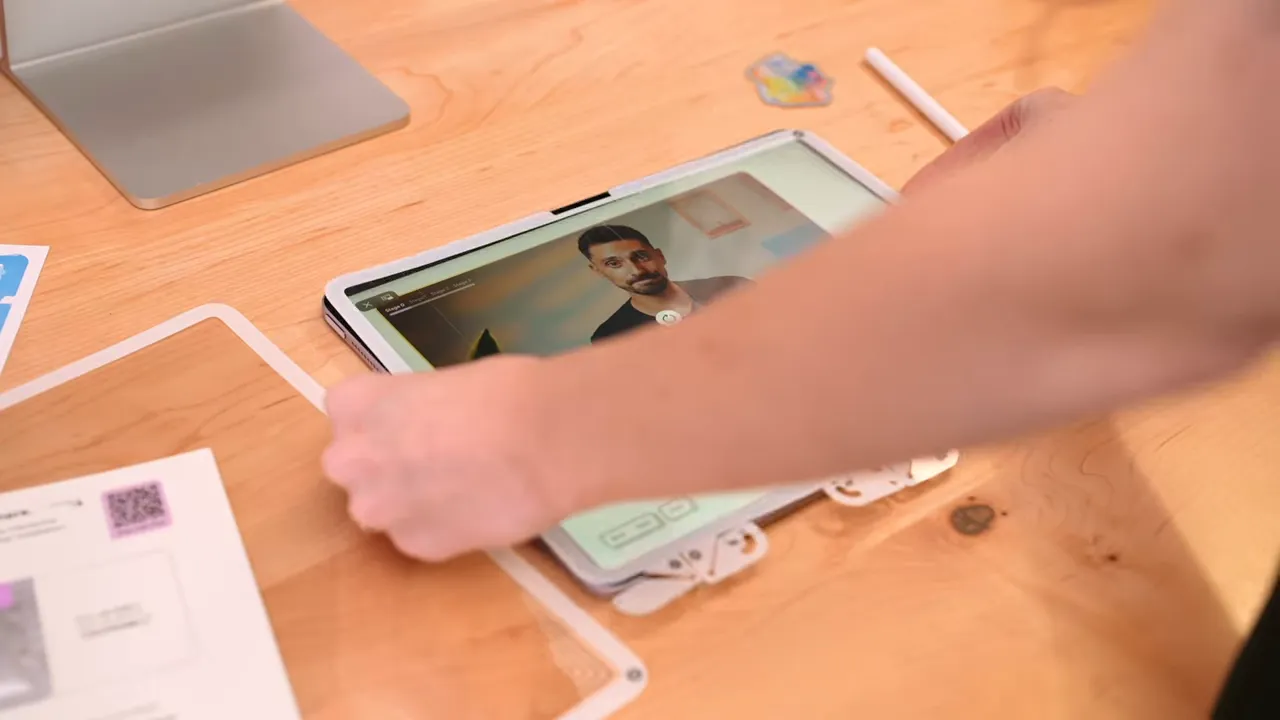 iPad inside Paperlike installation frame with alignment guide on screen