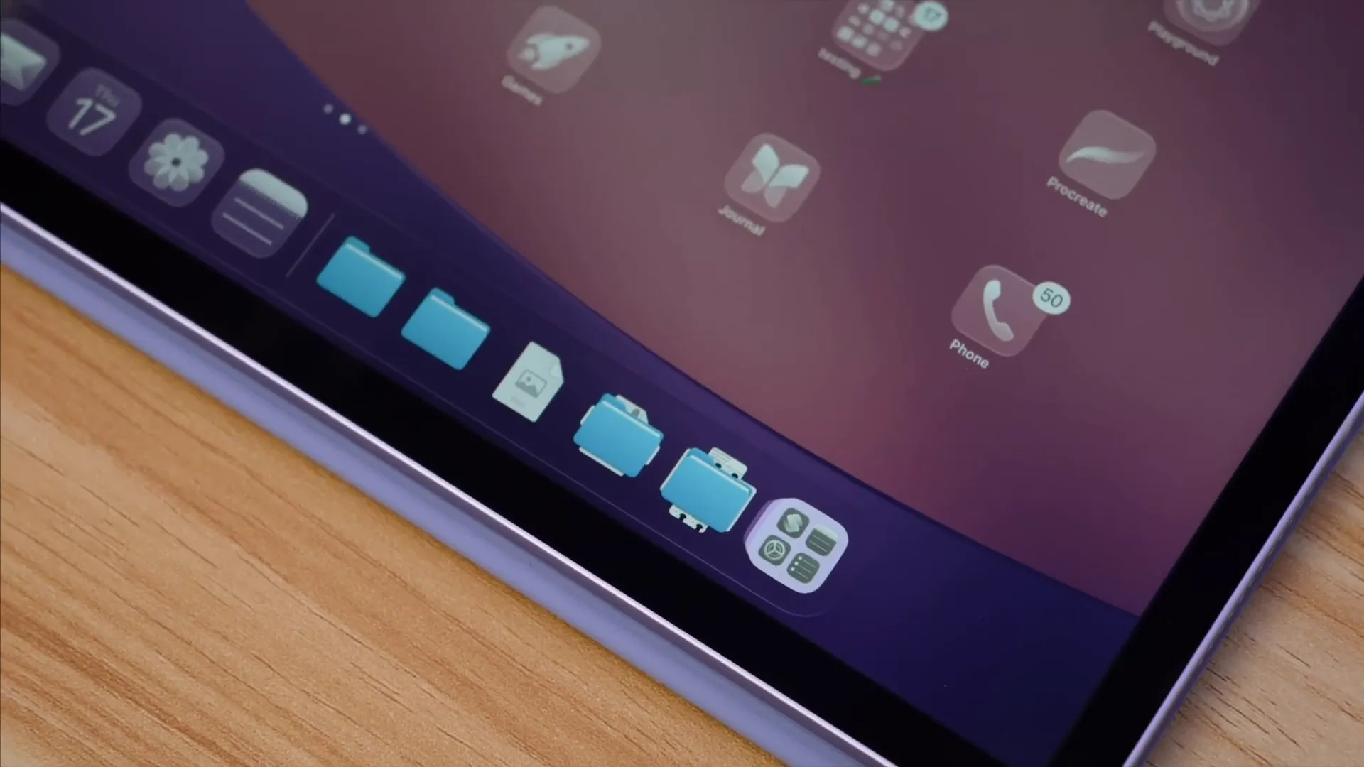 Dock with folders on iPad showing quick access to Files folders