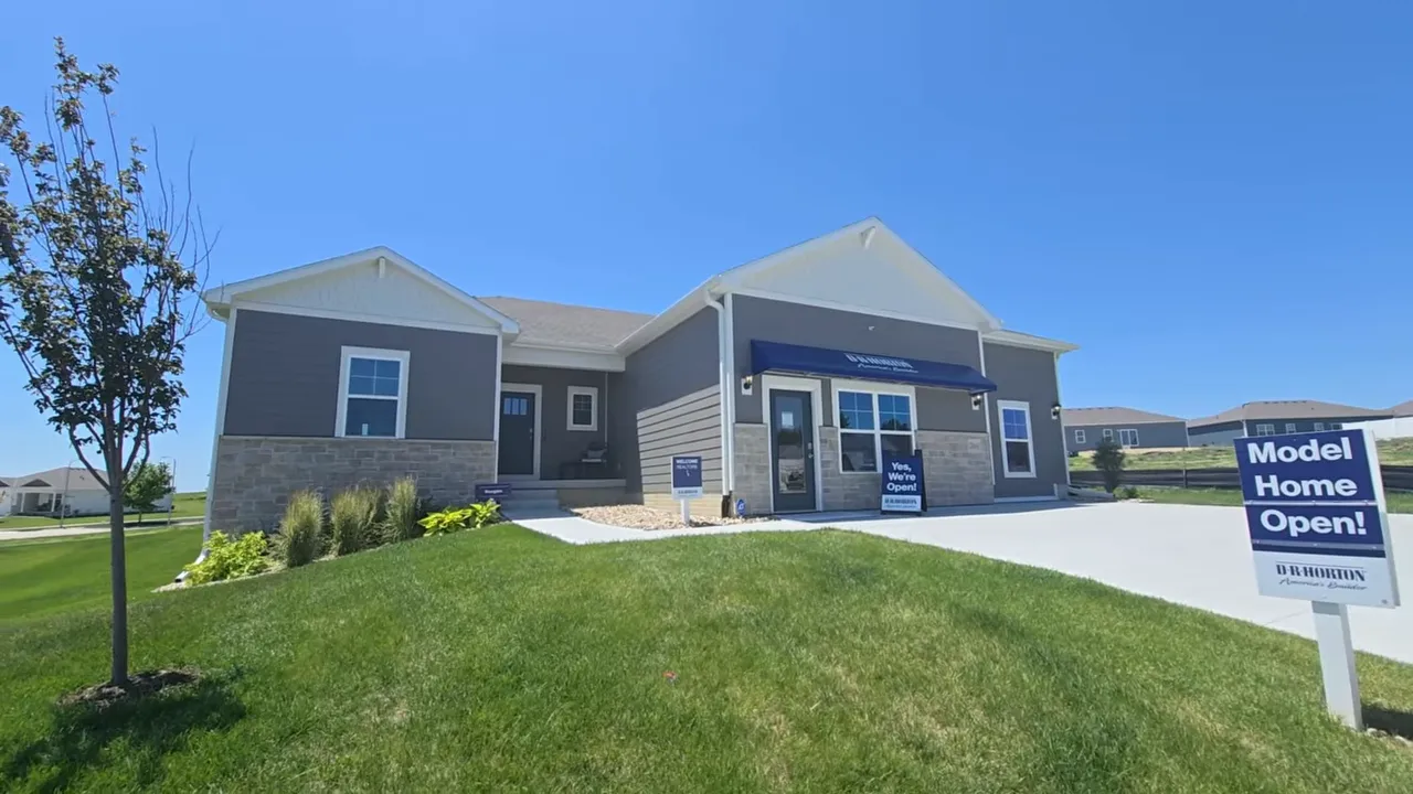Model home exterior with a model home open sign