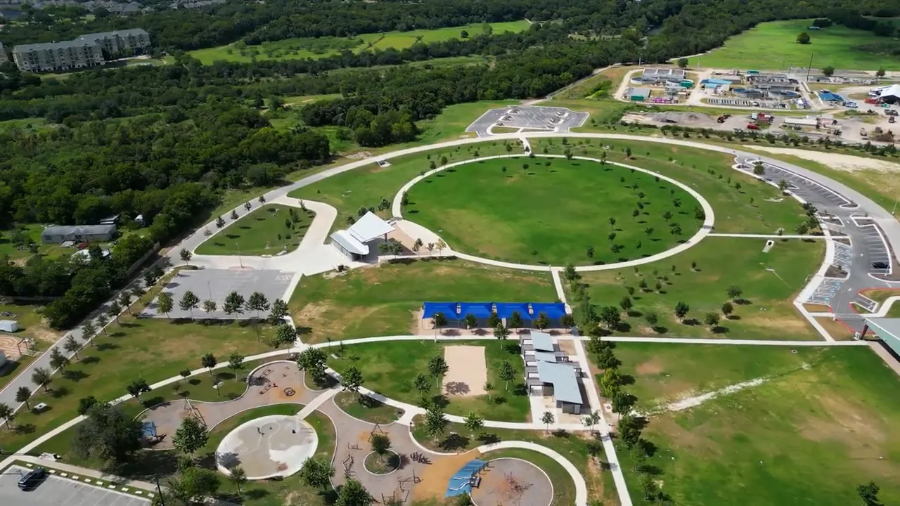 Aerial view of Buda City Park layout with playground areas and event facilities