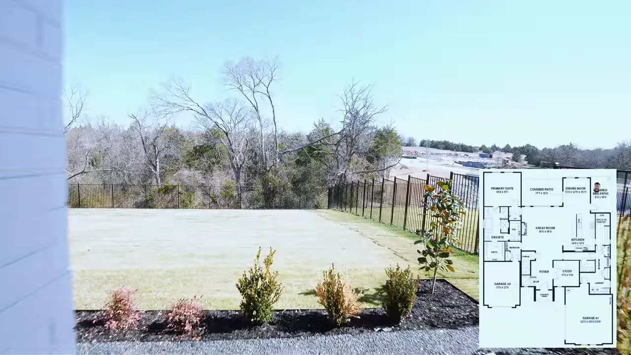 Park Hills backyard view from patio with lawn, fence and landscaping