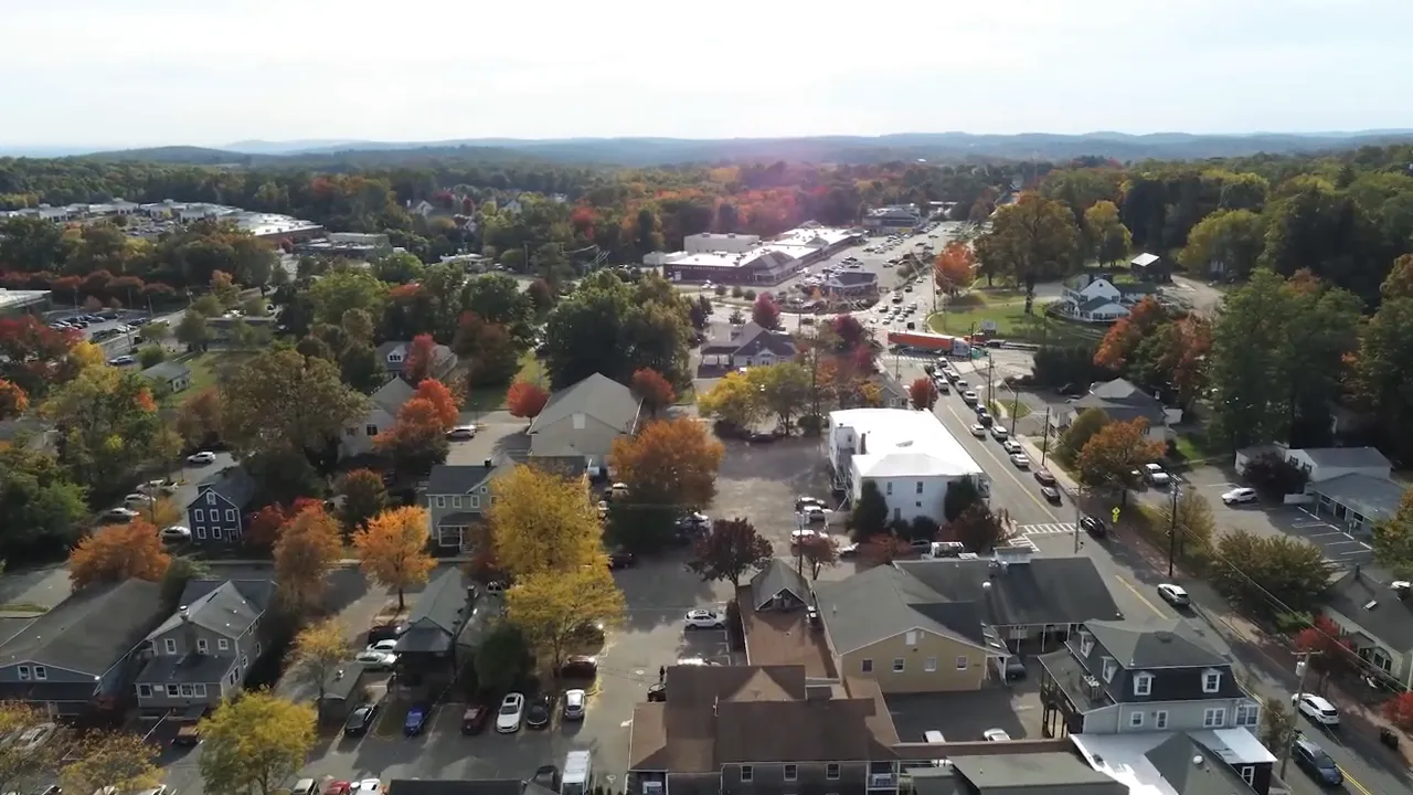 Aerial view showing roads, neighborhood blocks, and shopping area layout in Randolph NJ