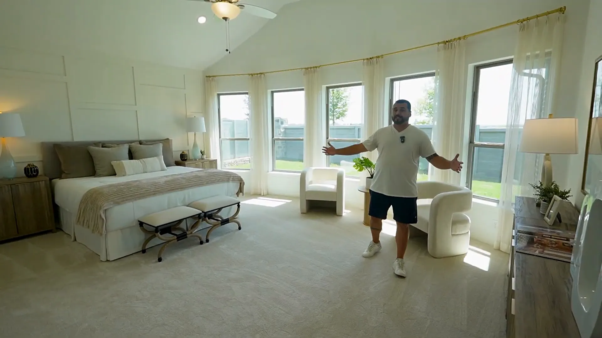 Primary suite entry with vaulted ceilings and bay window