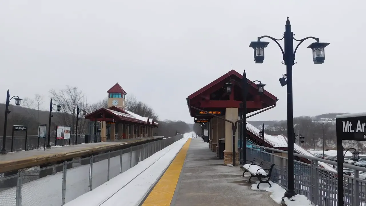 Exterior view of Mt. Arlington train station platform in snow