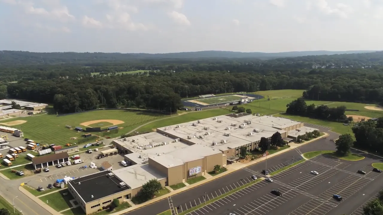 Aerial view of a school campus with athletic fields in Randolph or Roxbury, New Jersey