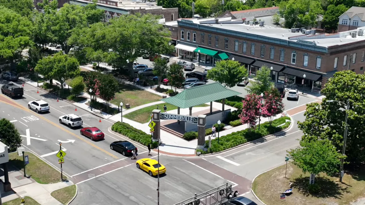 Family enjoying Summerville neighborhood life, walking and biking