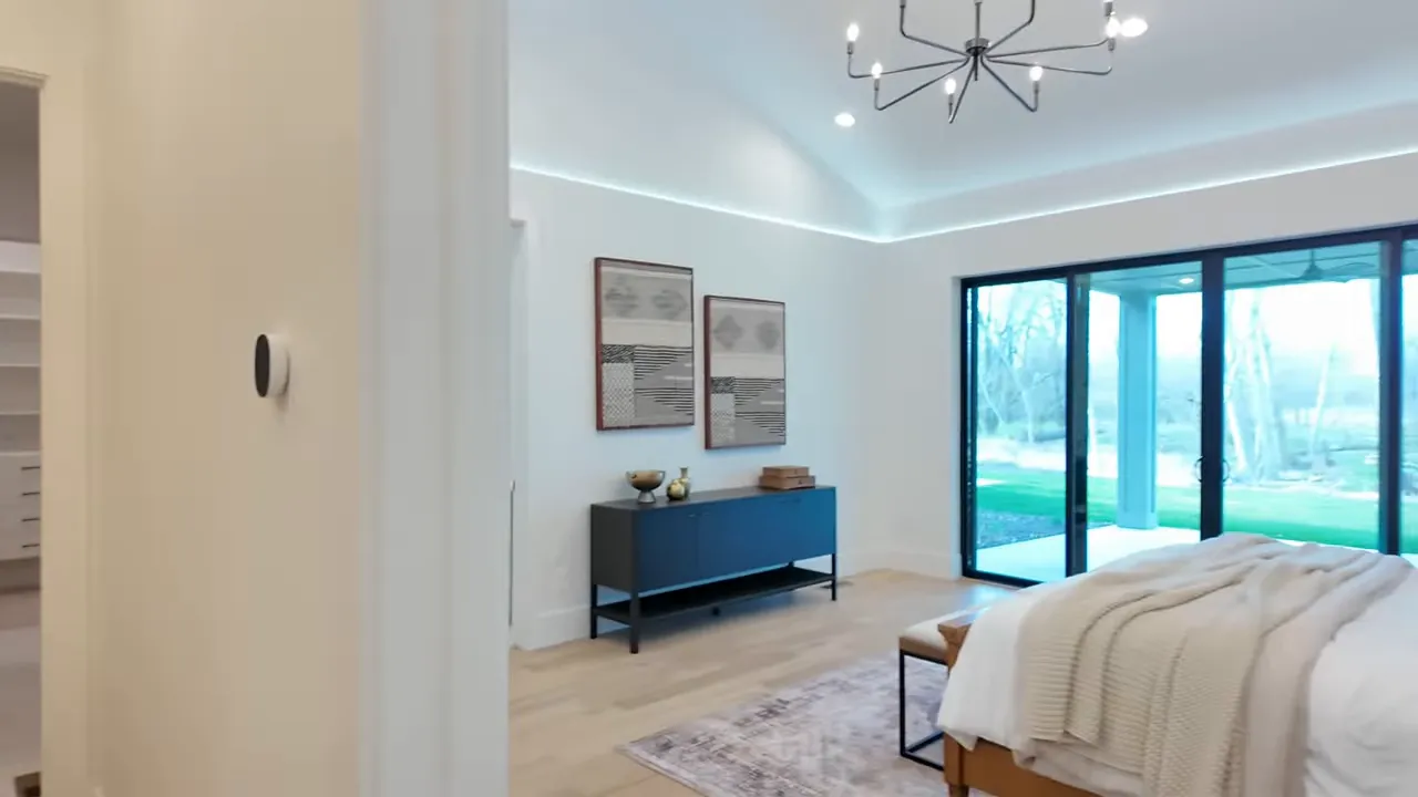 Bright interior bedroom or living area with large sliding doors and modern decor in a Middleton Idaho home