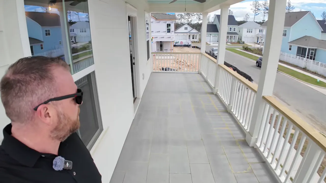 Long walkway on the upper porch of a Midtown Nexton spec home