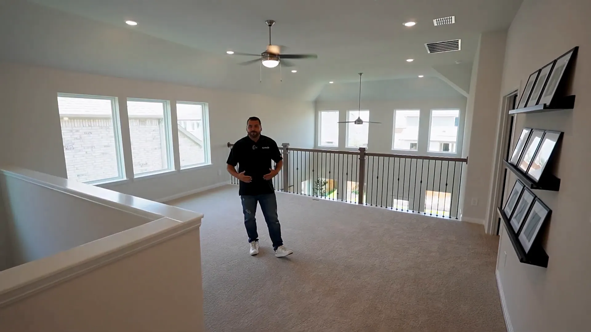 Large upstairs game room with abundant natural light