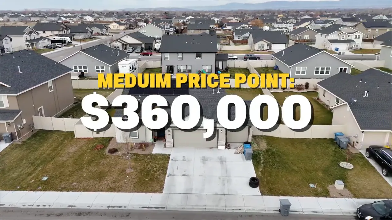 Aerial view of homes with on-screen median home price $360,000