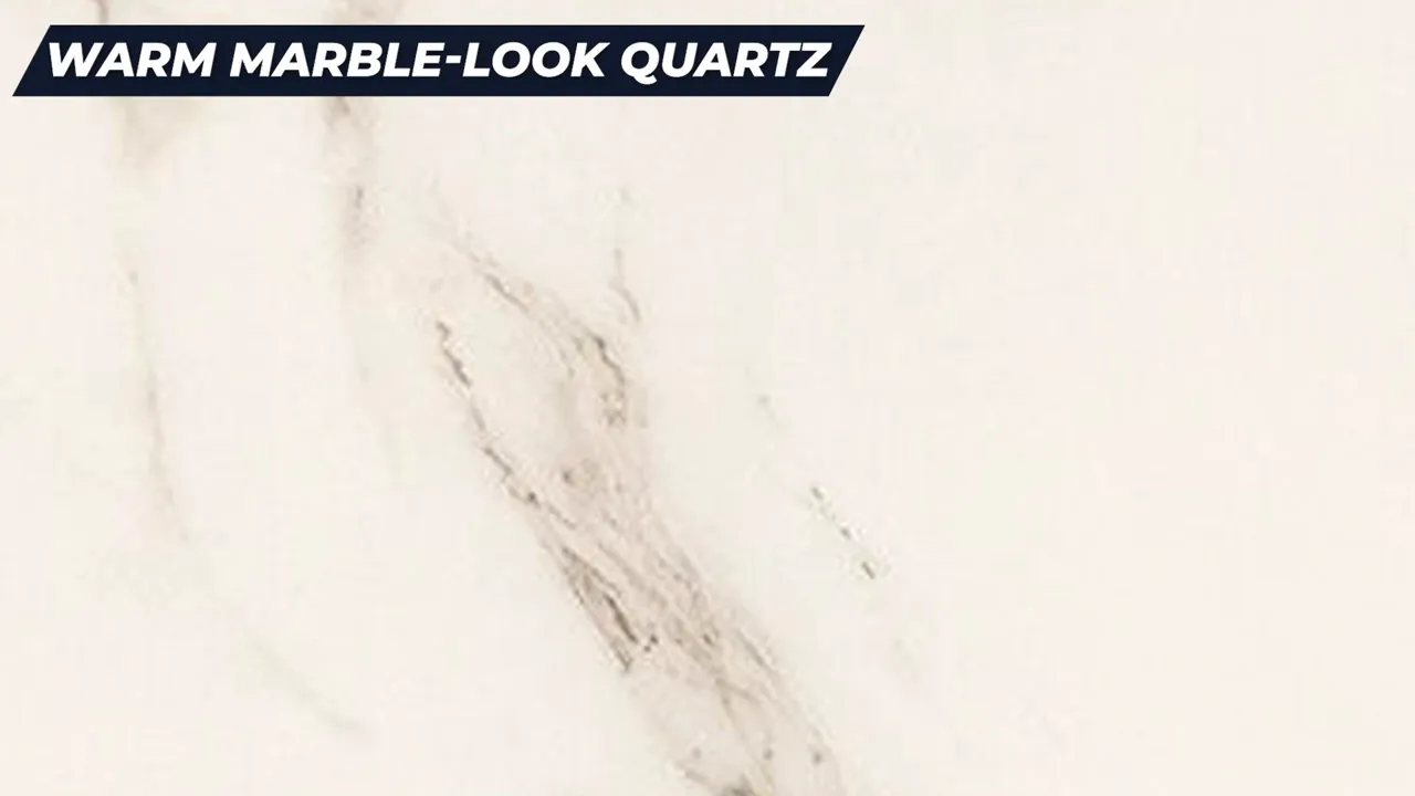 Warm marble-look quartz countertop with soft gray veining