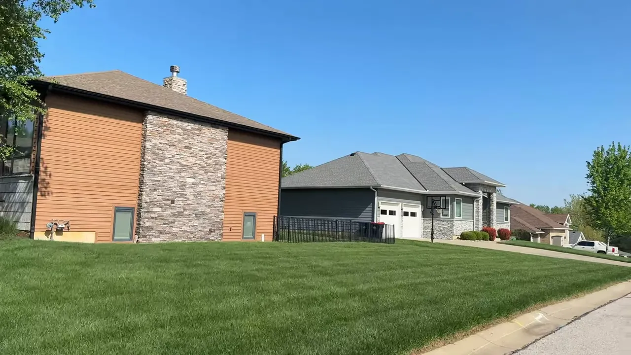 Hidden Pines Warrensburg MO home exterior showing large yard spacing and driveway
