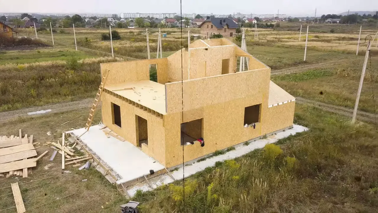 Drone view of a new home under construction in a DFW neighborhood