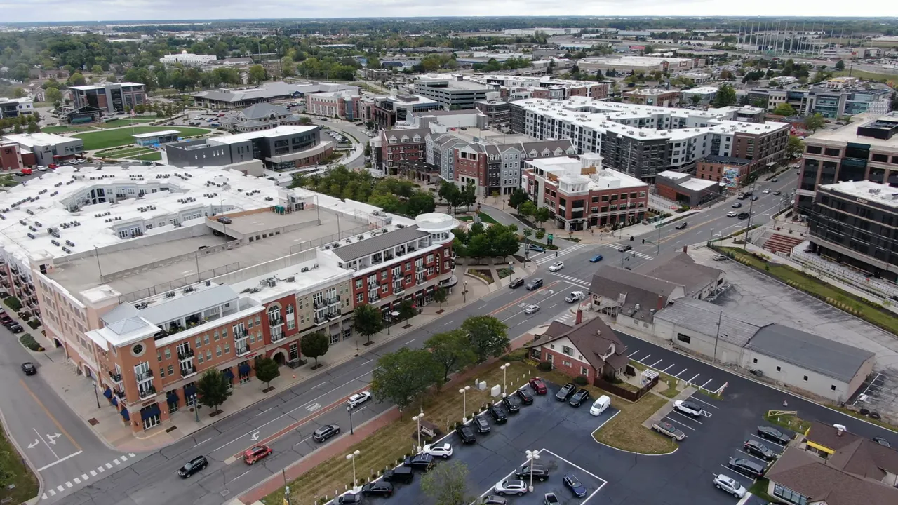 Aerial view of downtown Fishers with mixed-use buildings and surrounding neighborhoods