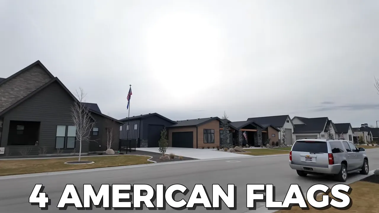 American flags in a neighborhood near Middleton Idaho next to a driveway and homes