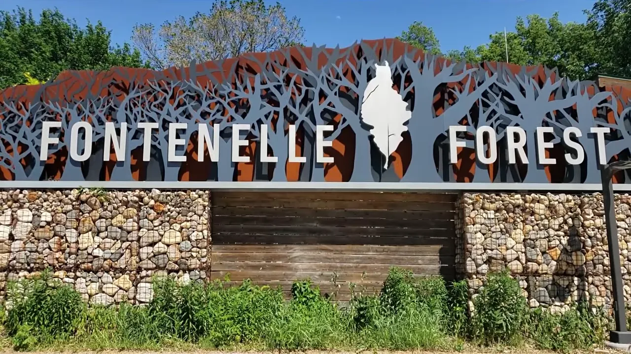Fontenelle Forest entrance sign on stone wall