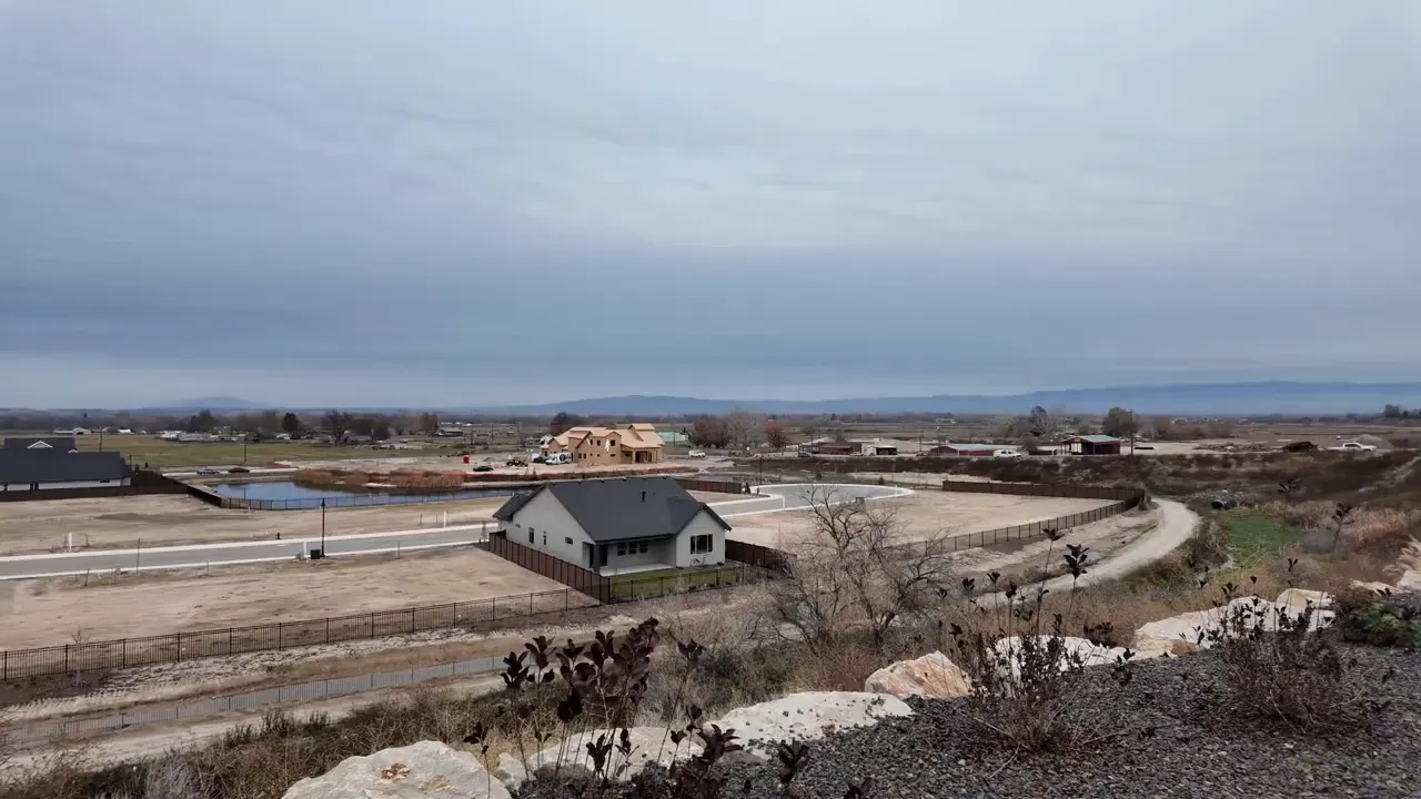 Backyard view overlooking canal corridor and homes under construction