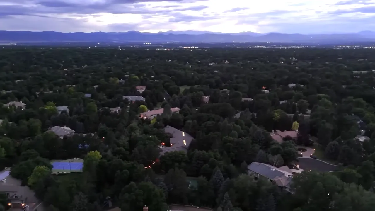 Aerial view of large estate homes surrounded by trees in Denver Colorado