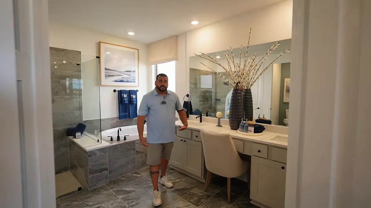 Primary bath with double vanity and makeup area