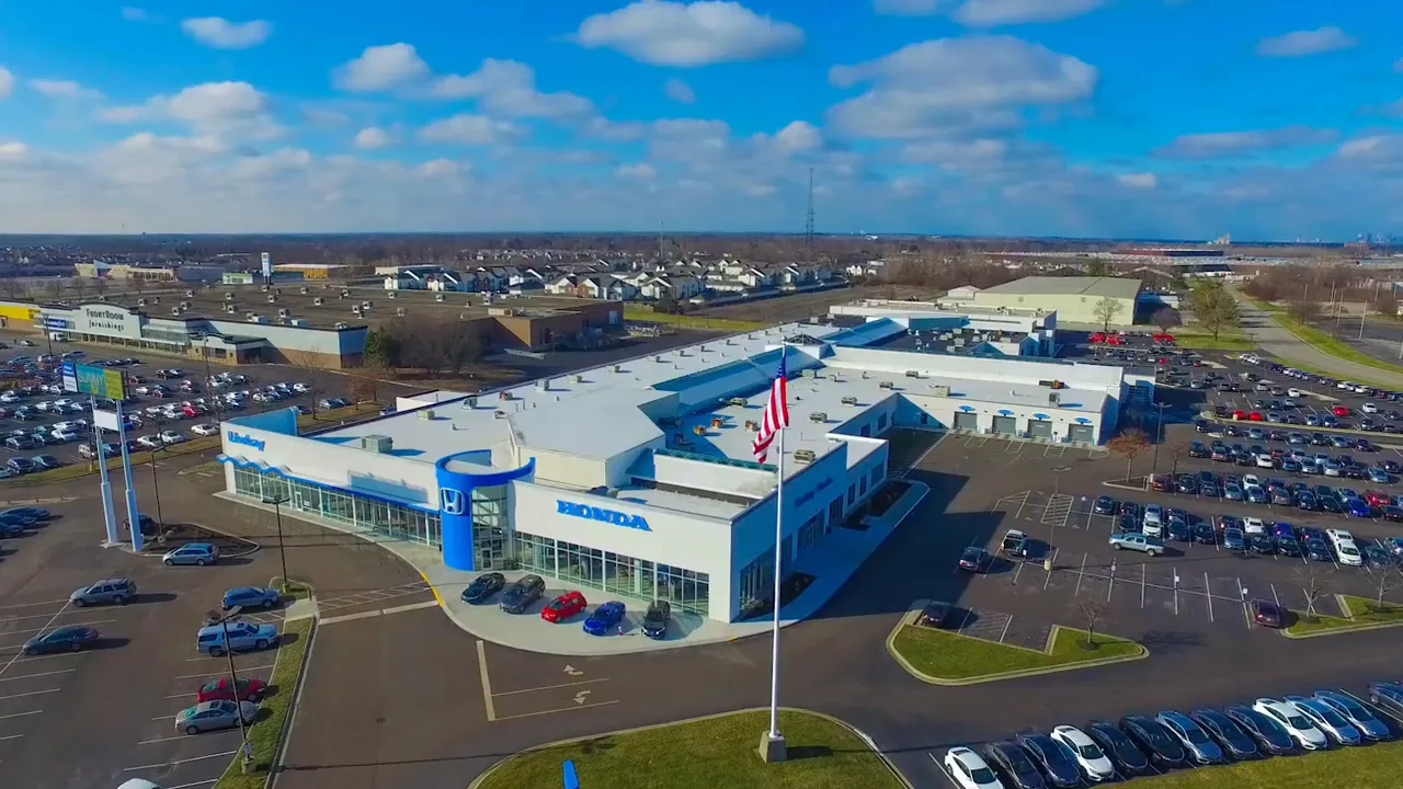 Aerial view of a Honda facility with the word Honda on screen