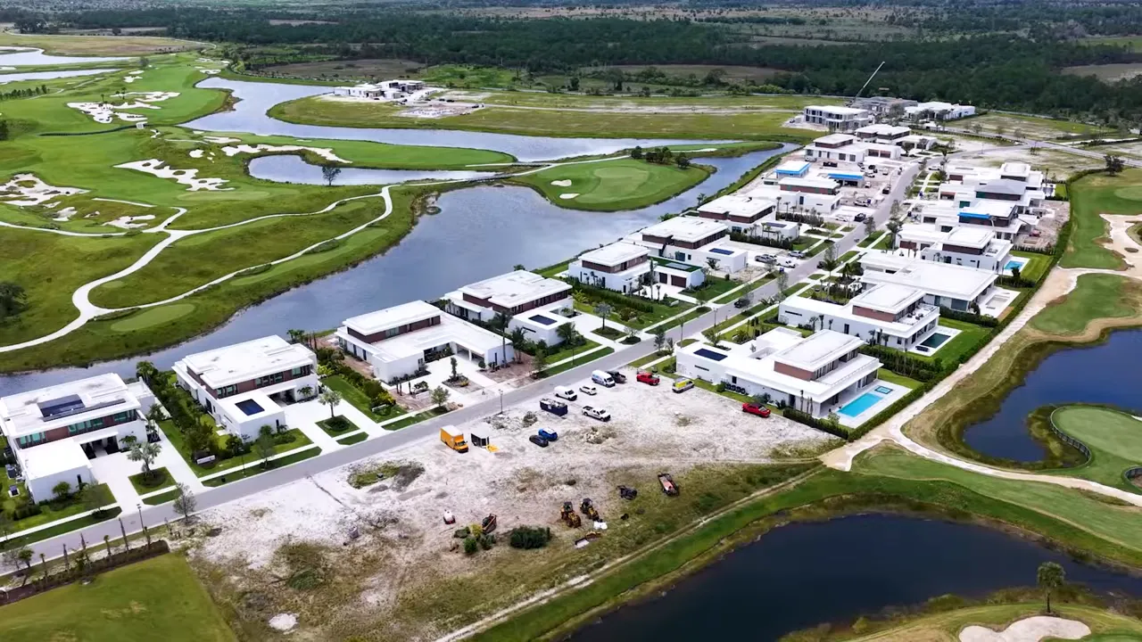 Aerial view of new construction and golf course development in Avenir