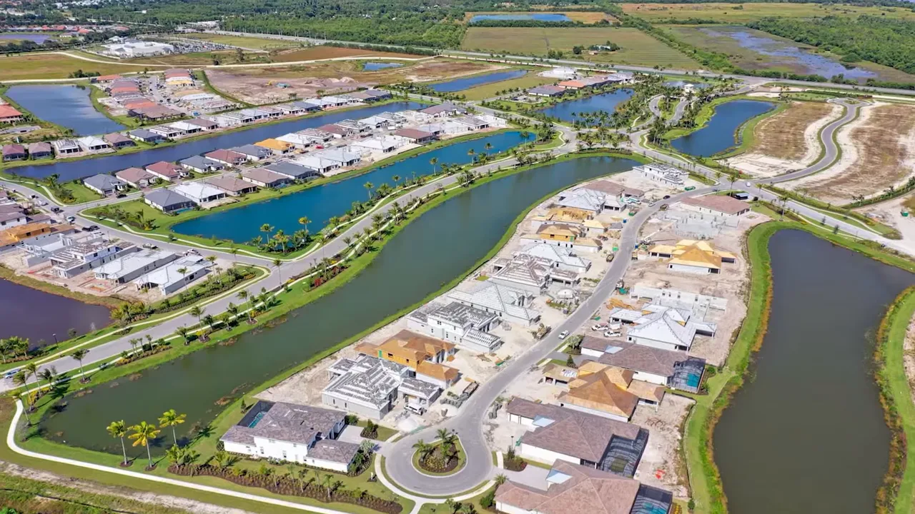 Aerial view of Esplanade by the Islands Naples Florida with lakes and community roadways