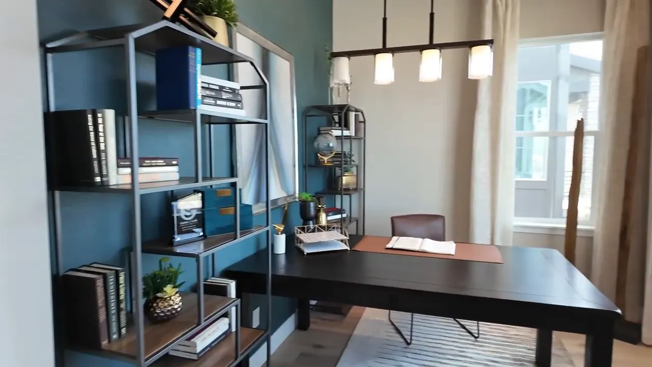 Residence 3 front office with built-in shelving and long desk near the entry