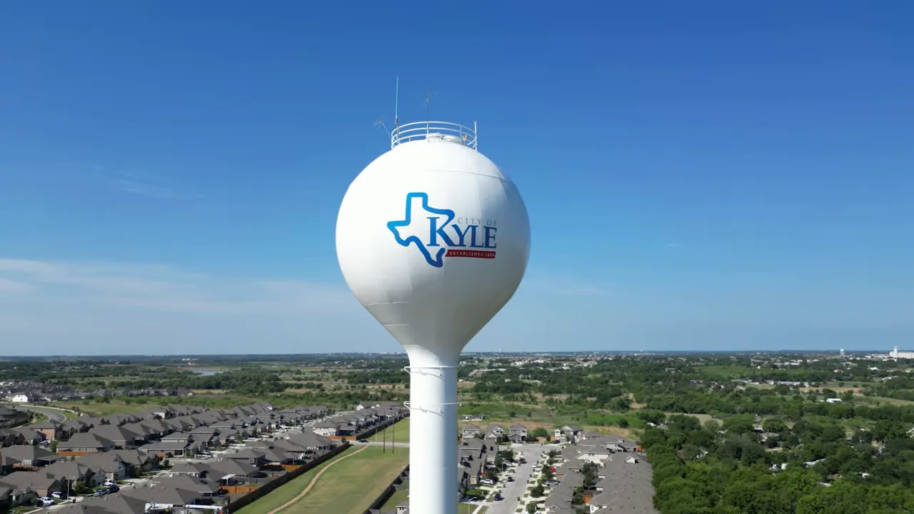 Aerial view of Kyle water tower above surrounding neighborhoods
