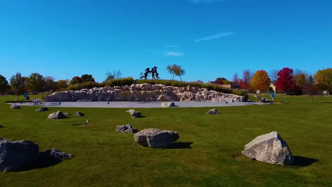 Large dark horse sculptures in a green Dublin park