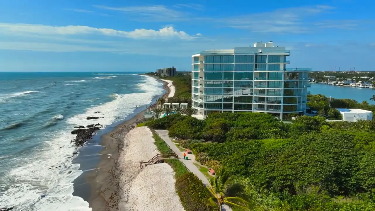 Oceanfront condominium and sandy beach along the coast near Jupiter, Florida