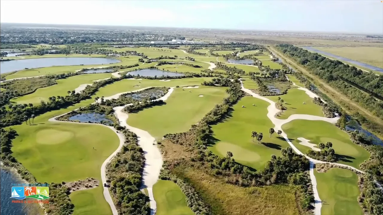 High-resolution aerial of Osprey Point golf course showing fairways, ponds and surrounding parkland