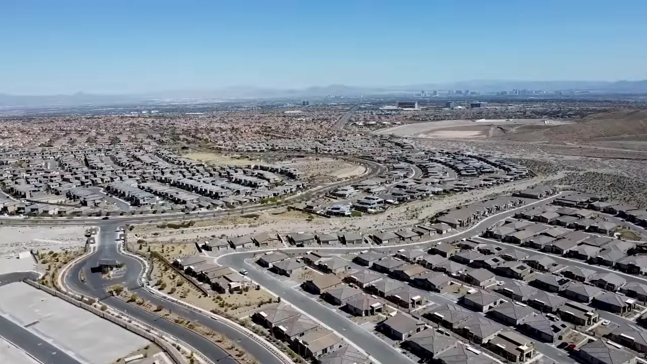 Las Vegas neighborhood aerial view with text showing 500 thousand dollars for newer housing options