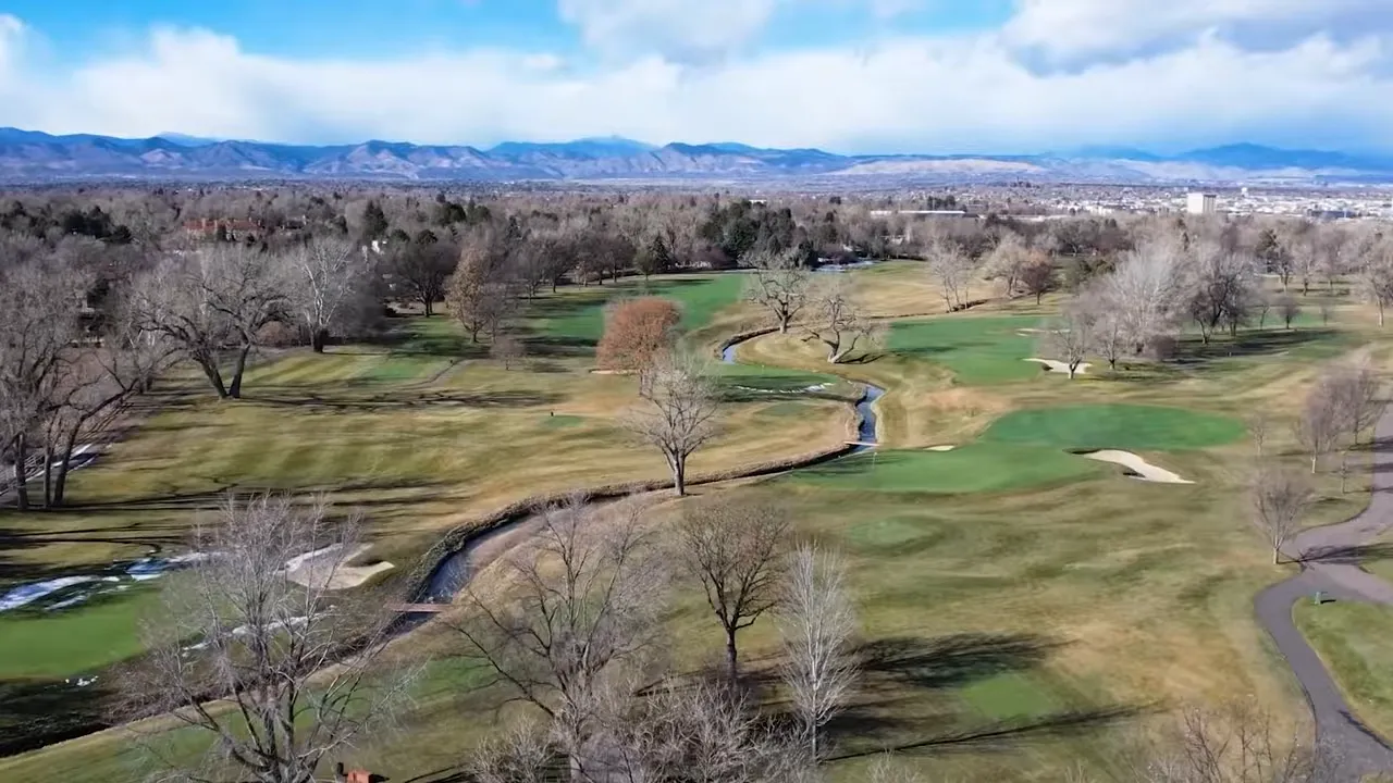 Aerial view of Cherry Hills Village green space and winding water feature