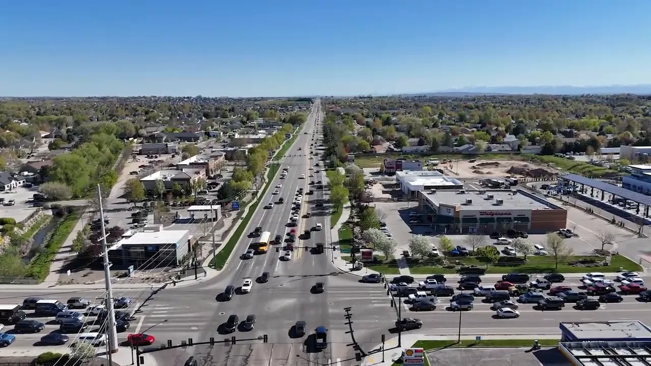 Aerial view of interstate highway interchange with multiple lanes and ramps